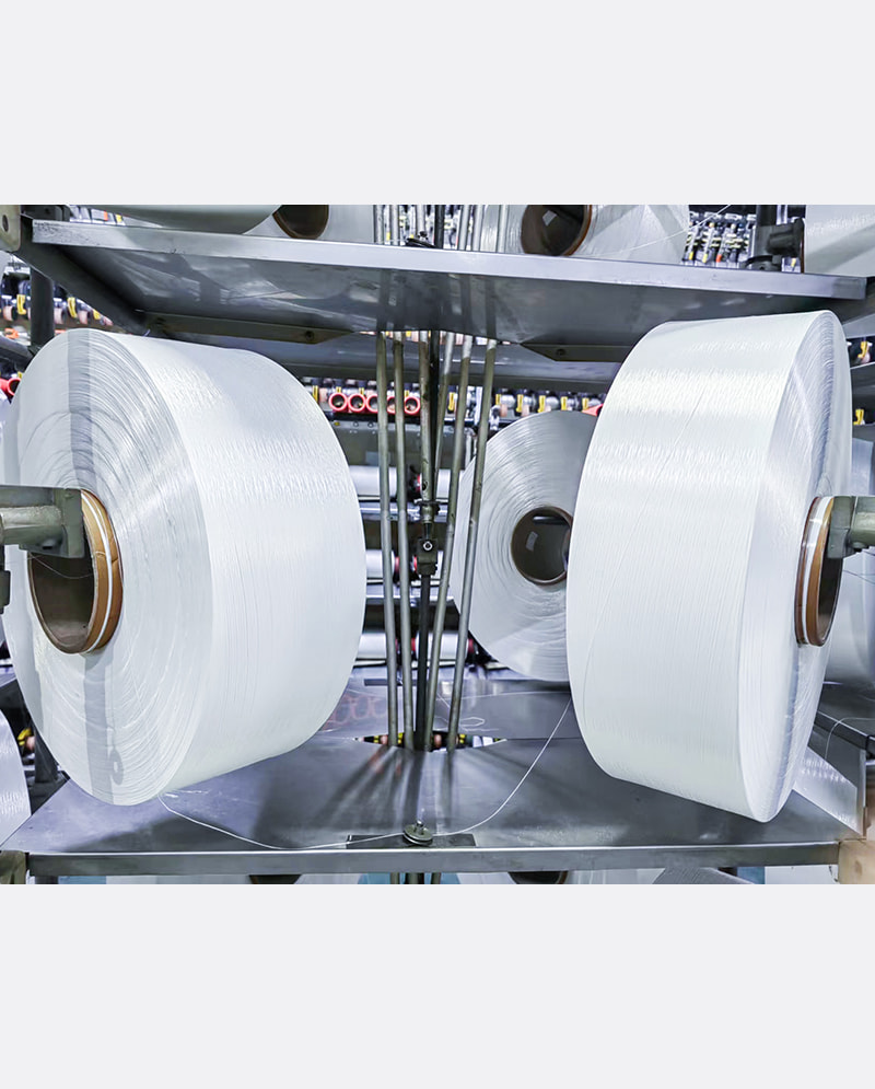 Hvad er de brede anvendelser af fuldt trukket garn i mode- og industriområder?